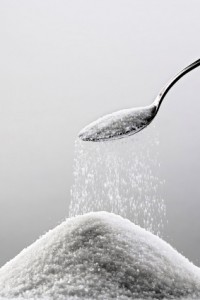 heap of sugar and a spoon